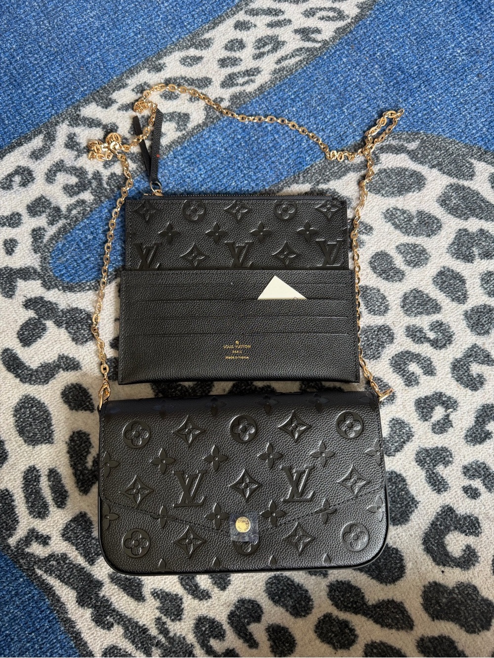 Louis. Vuitton. Black Embossed Crossbody Purse with Gold Chain - Picture 2 of 7